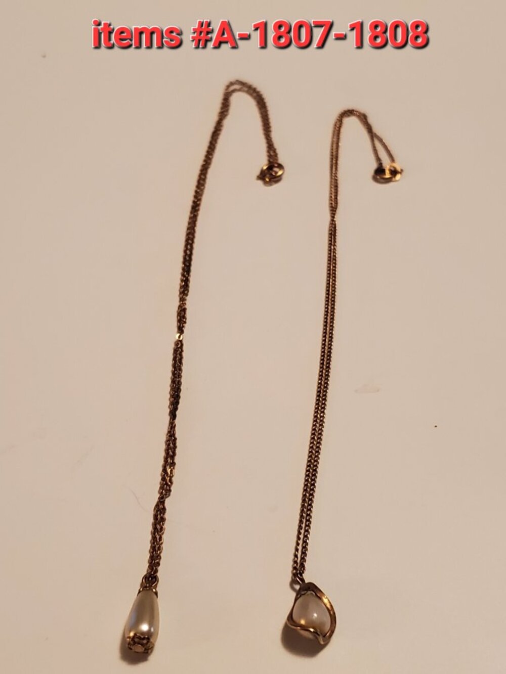 2 Gold Chain Necklaces with pendants, items #A-1807-1808, wt,. 4 grams.